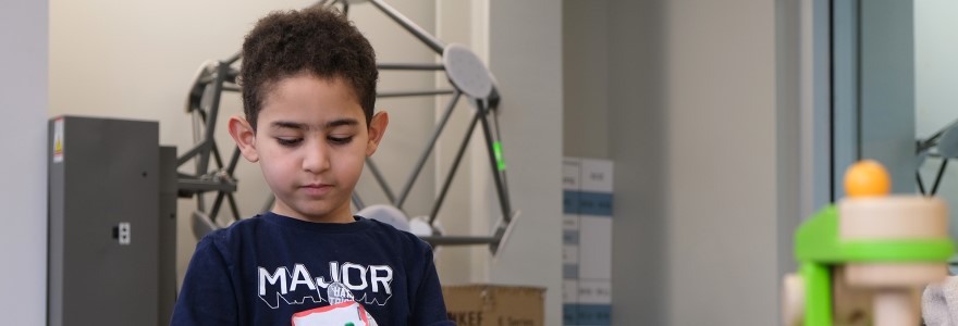 A child plays with sensory-based objects during a day camp in January 2020, held by the Sensory Perception Research lab at Western University. (Maggie MacLellan/Western Communications)