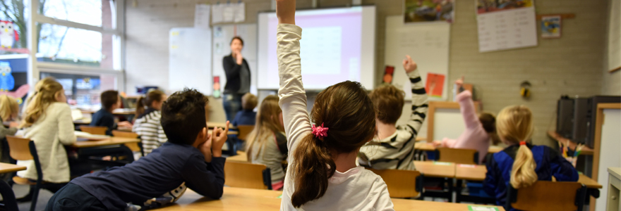 Students in a classroom, photo by Arthur Krijgsman from Pexels